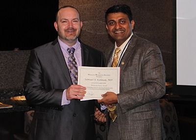 Dr Keith Baldwin receiving the Jacquelin Perry award